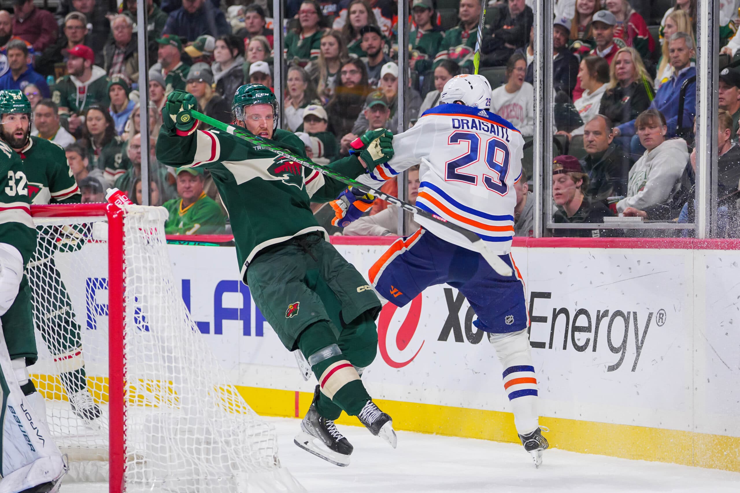 Edmonton Oilers Leon Draisaitl hits Minnesota Wild player