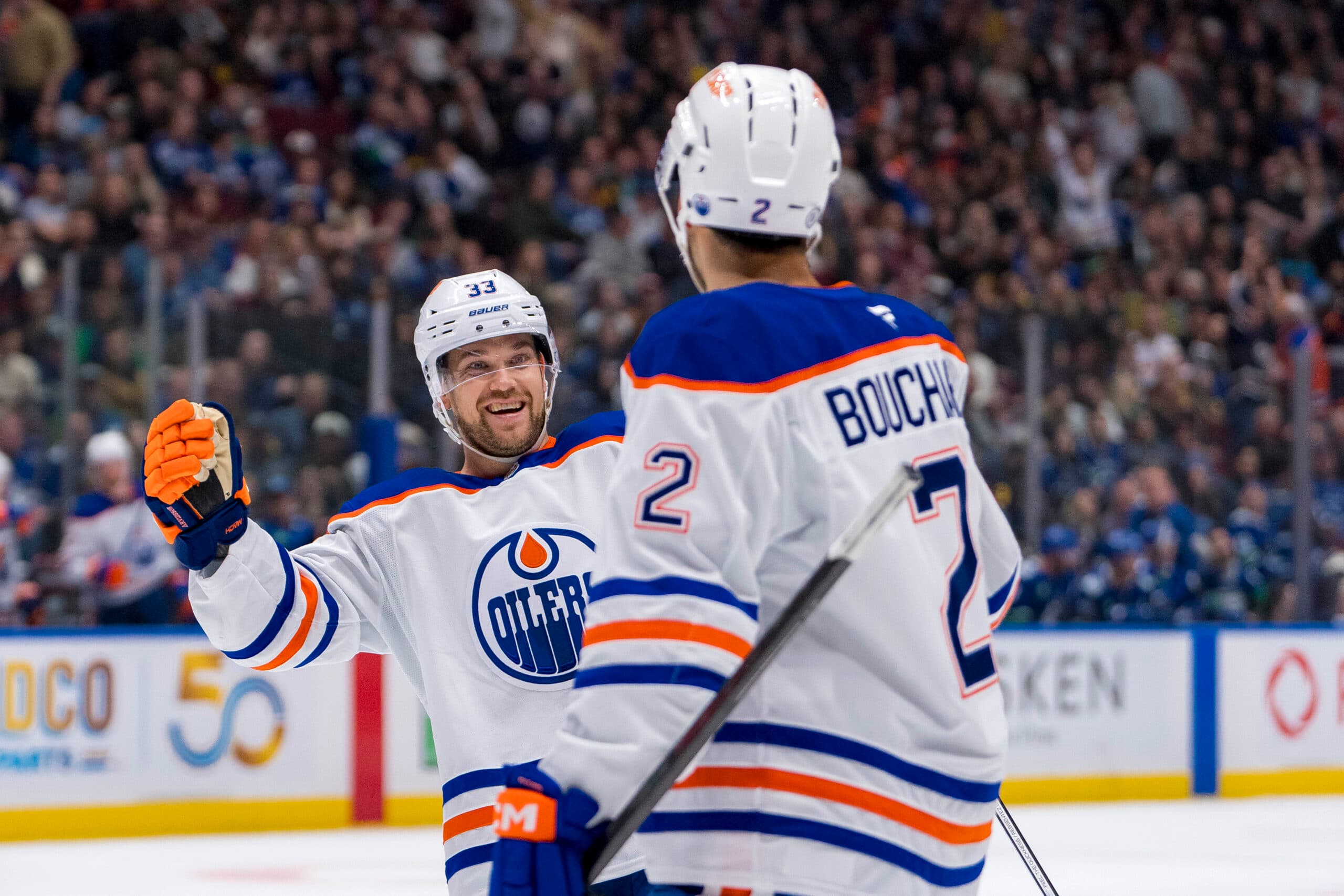 Edmonton Oilers Viktor Arvidsson and Evan Bouchard