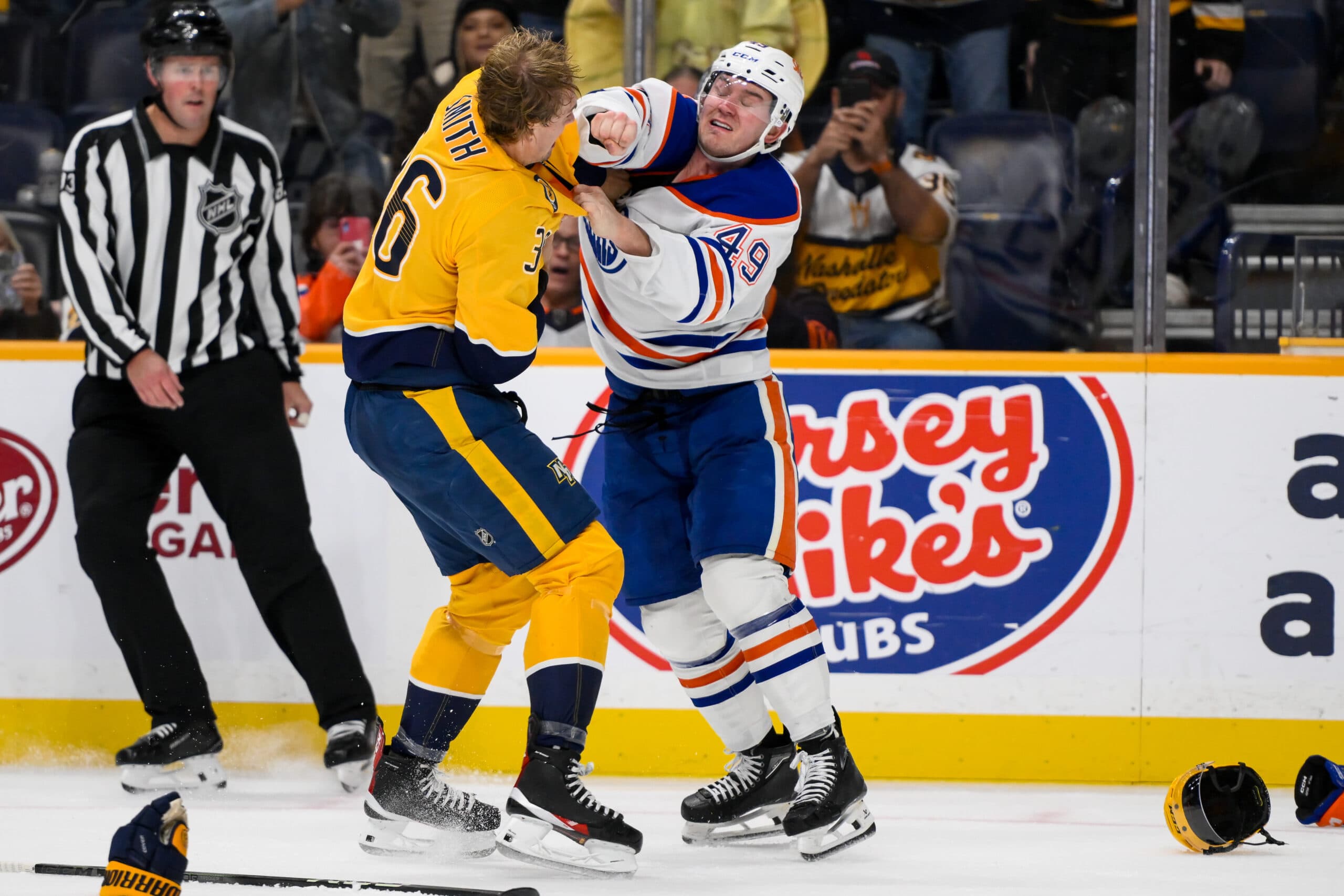 Edmonton Oilers defenceman Ty Emberson fighting Nashville Predators forward