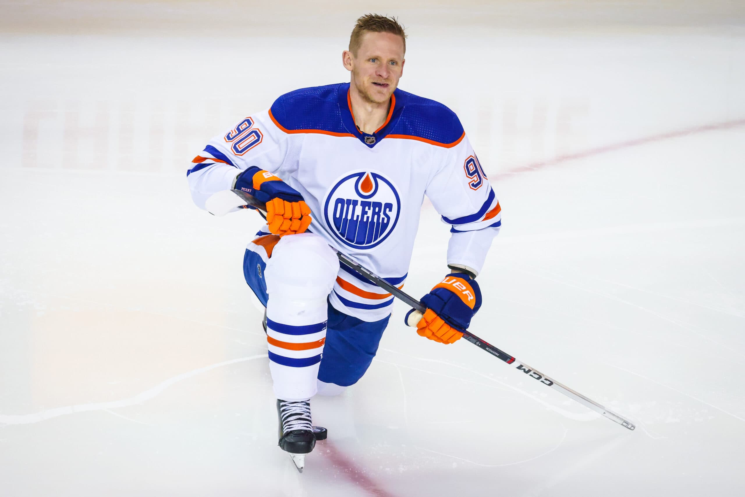 Edmonton Oilers Corey Perry kneeling on ice